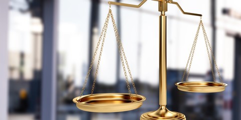 Law scales on table, close-up view