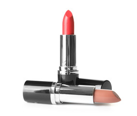 Bright lipsticks on white background. Professional makeup product