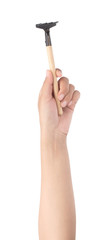 hand holding Steel rakel with a wooden handle isolated on a white background.