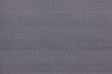 gray taextured background, plastic mat with decorative pattern