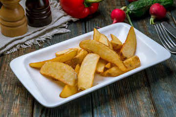 The potatoes wedges on the Board