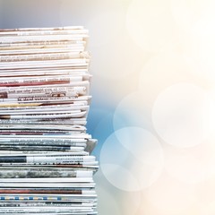 Pile of newspapers on background