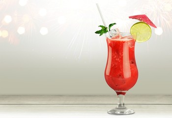 Glass of alcohol  cocktail on background