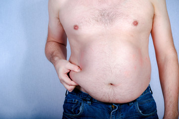Naklejka premium Shirtless overweight caucasian man