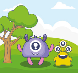 cute monsters couple in the field