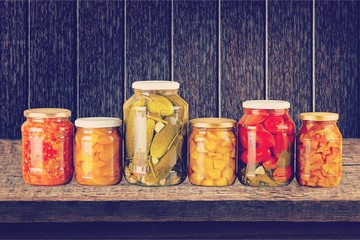 Home Canning Jars of Summer Harvest Vegetable on White Backgroun