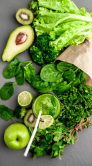 smoothie with vegetables, avocado, apple, kiwi . sports nutrition