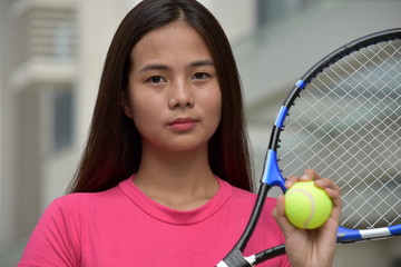 Unemotional Fitness Filipina Person With Tennis Racket