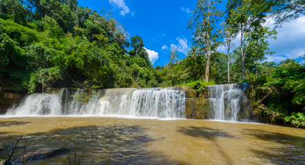 Beautiful waterfall in natural "Si Dit Waterfall" with blue sky in khao kho national park