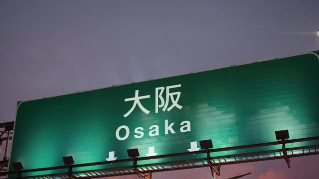 Airplane Landing Osaka during a wonderful sunrise