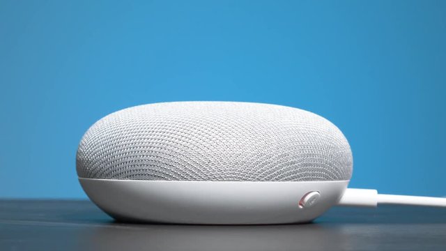 Turning OFF the microphone of a smart home assistant for more privacy. Switching the voice-activated features of the device.