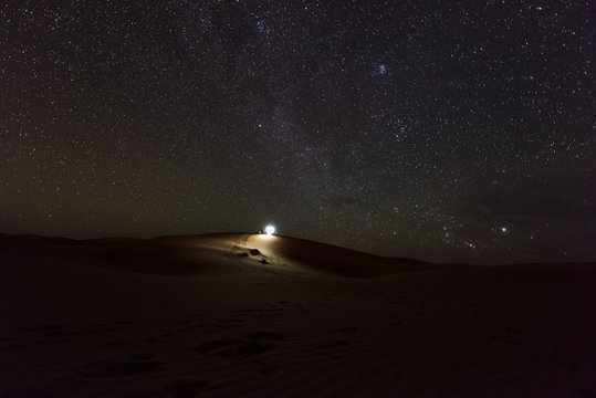 Night time landscape of the stars and sand dunes in the Sahara Desert, Merzouga, Morocco