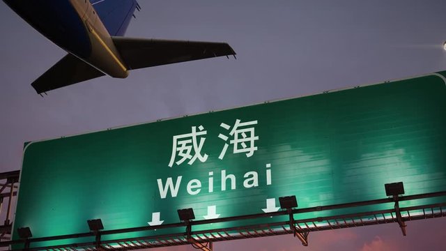 Airplane Take off Weihai during a wonderful sunrise