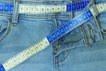 Obesity. Background waist measurement line with jeans. Weight control with people who are vulnerable to obesity.