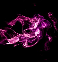 Purple smoke on black background