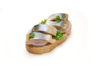 sandwich with herring and onion on white background 