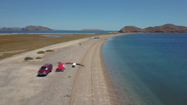 Aerial flyover, beautiful beach at Bahia de los Angeles, Baja California, Mexico.
