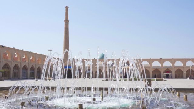 Fountain on Imam Ali Square, Isfahan, Iran. Ali Mosque Minaret