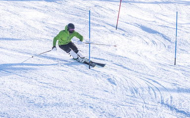 Fototapeta na wymiar People are enjoying skiing / snowboarding 