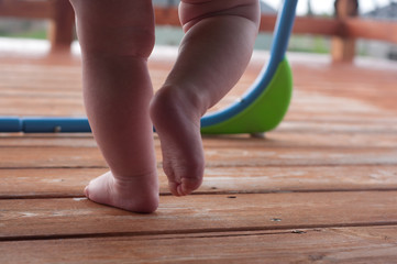 baby feet in bouncer