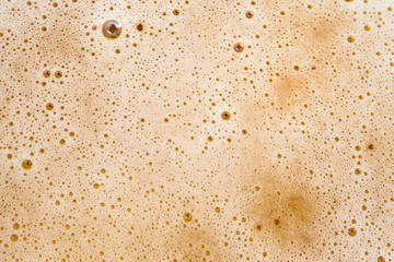 Glass of beer top view with beautiful beer bubbles texture - 242789620