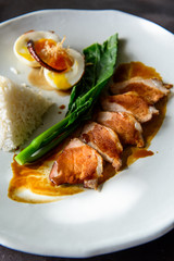 Grilled pork, boiled egg with steamed jasmine rice
