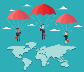 Business people with parachute over world map