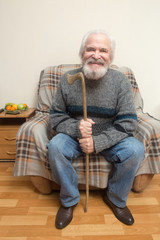 The old man in the armchair at home