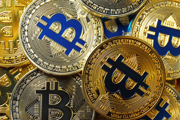 Fototapeta na wymiar Many golden and silver bitcoins