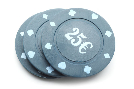 Chips for gambling games in casino on white background
