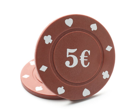 Chips for gambling games in casino on white background