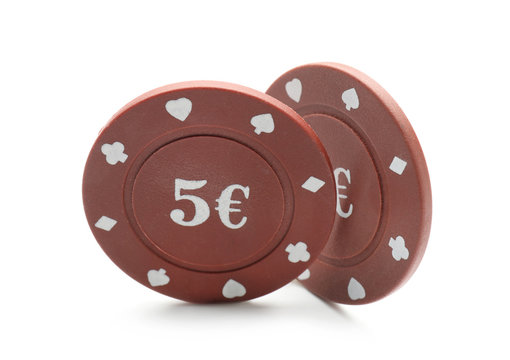 Chips for gambling games in casino on white background