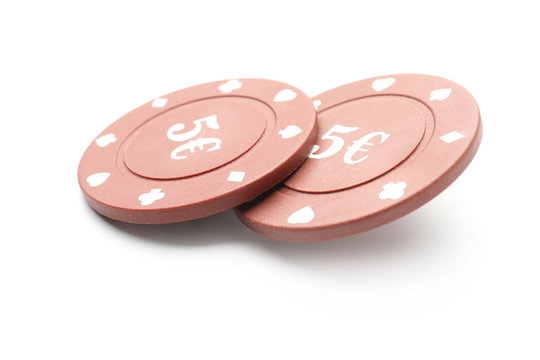 Chips for gambling games in casino on white background