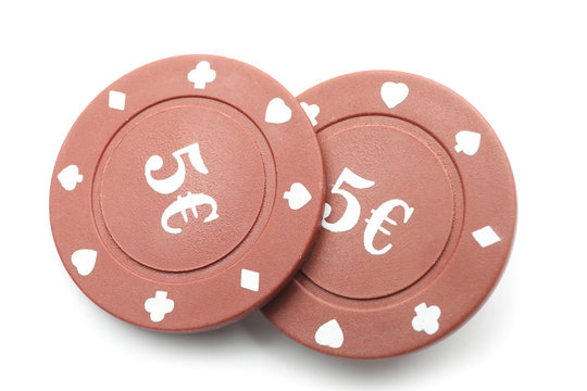 Chips for gambling games in casino on white background