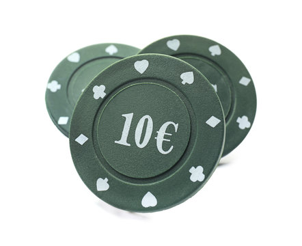 Chips for gambling games in casino on white background