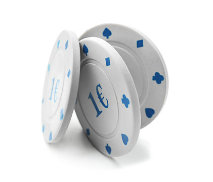 Chips for gambling games in casino on white background
