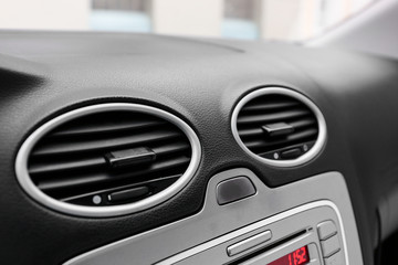 Fototapeta premium Air conditioner system in modern car, closeup
