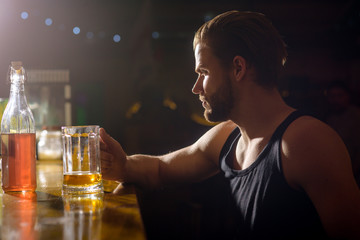 Refreshing beer to drink right now. Alcohol addiction and bad habit. Man drinker in pub. Handsome man drink beer at bar counter. Alcohol addict with beer mug. Addicting to alcoholic drink