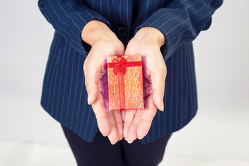 Red gift box from business woman