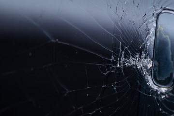 Broken smartphone screen, cracks and shattered glass under various eels