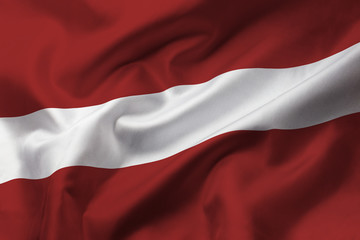Satin texture of curved flag of Latvia