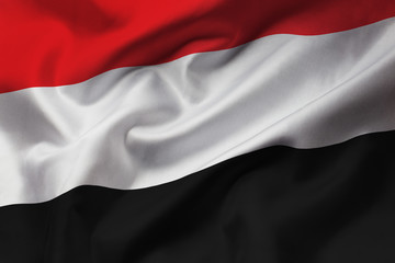 Satin texture of curved flag of Yemen