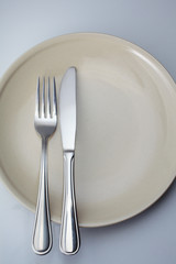 fork and spoon on plate