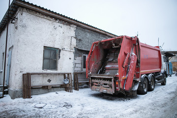 Fototapeta na wymiar Garbage trucks in the city, garbage removal