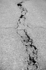 cracked asphalt after earthquake