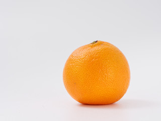 citrus fruit mandarin orange on white background with zest.