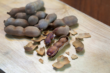 Sweet tamarind on Chopping Wood  background Thai fruits