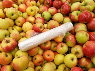 Ripe apples in the store as background