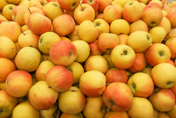 Ripe apples in the store as background