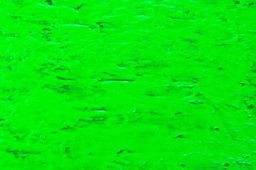 fluorescent color paint on a surface background or texture